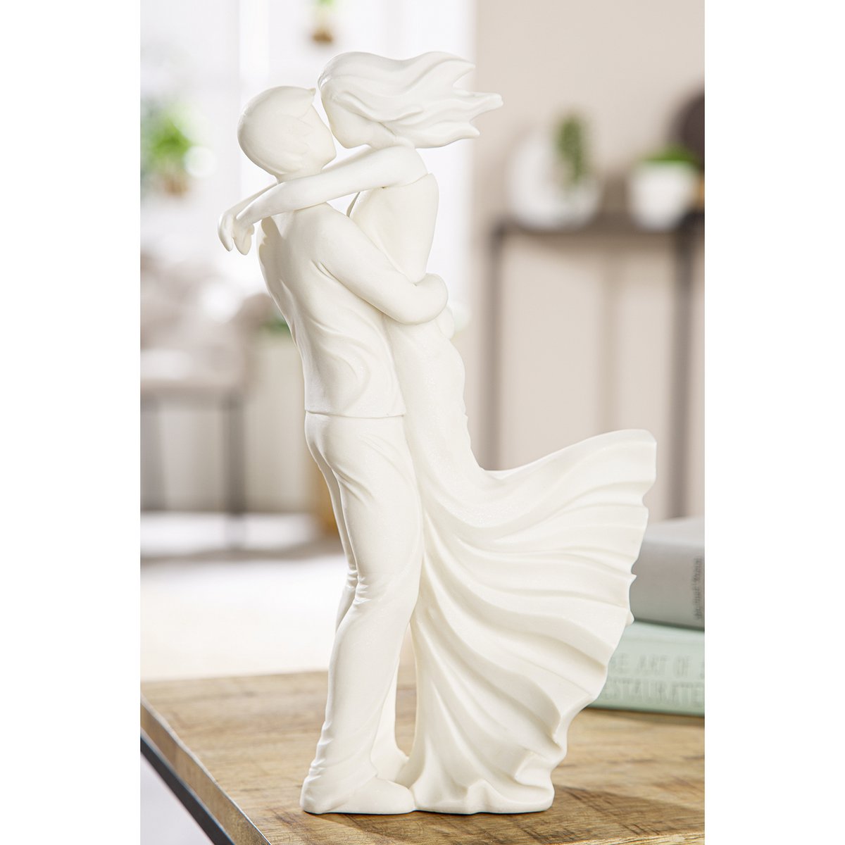 Figuur "Paar in de wind" H. 30,5 cm
