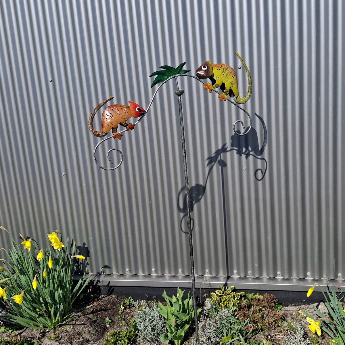 Windspinner Kameleon op een stok